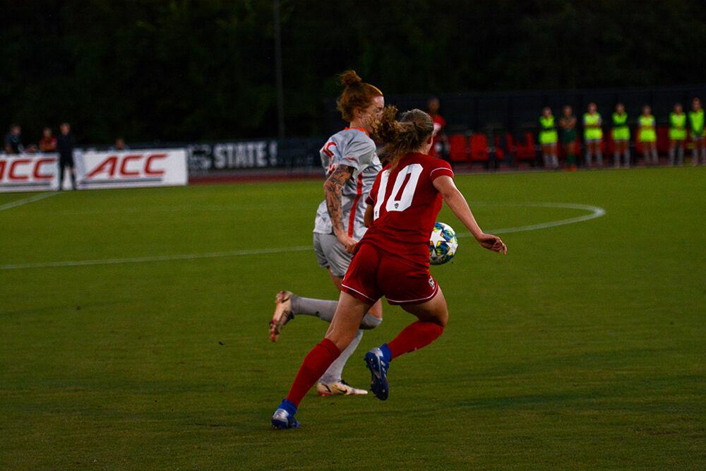 Freshman midfielder Annika Wohner fights for the ball against Clemson junior midfielder Hal Hershfelt in the game on Thursday, Sept 23, 2021 at Dail Soccer Field. Wohner had one goal in NC State's 2-1 loss to Clemson.