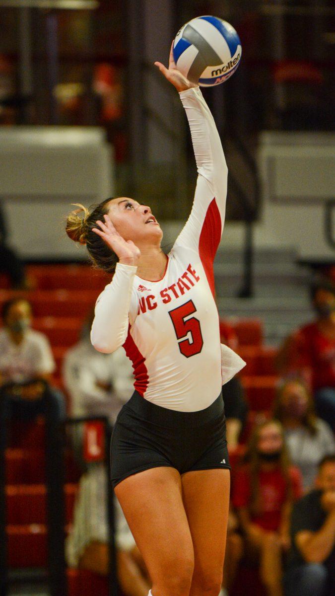 Junior setter Kristen McDaniel serves the ball during the NC State vs. Wofford game on Friday, Sept 3, 2021 in Reynolds Coliseum. McDaniel had 35 assists in the Wolfpack's 3-0 win over the Terriers.