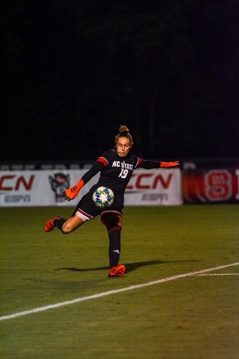 Freshman goalkeeper Maria Echezarreta punts the ball into play during NC State's game against Clemson Thursday, Sept. 23, 2021 at Dail Soccer Field. Echezarreta had six saves in the Wolfpack's 2-1 loss to the Tigers.
