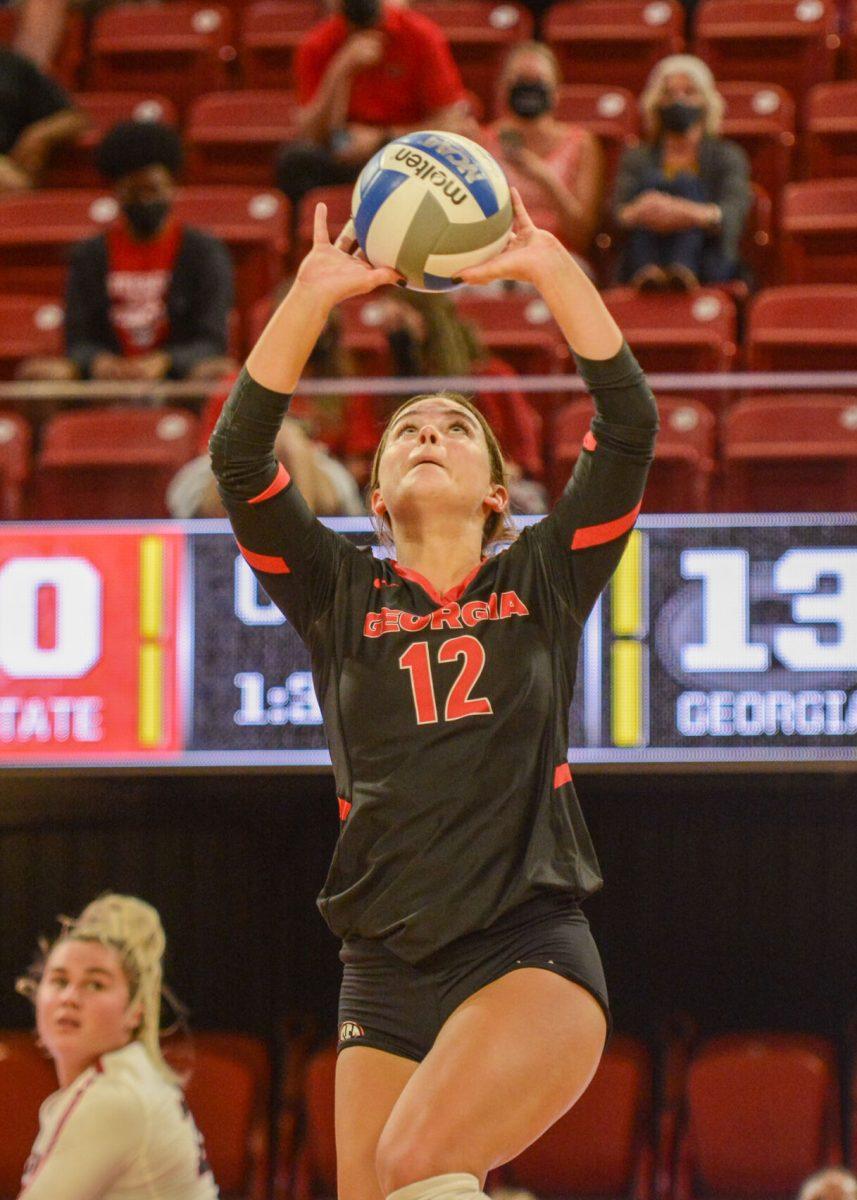 Freshman setter Clara Brower hits against NC State during the match on Thursday, Sept. 16, 2021 Georgia Bulldogs in Reynolds Coliseum. The Wolfpack beat the Bulldogs 3-1.