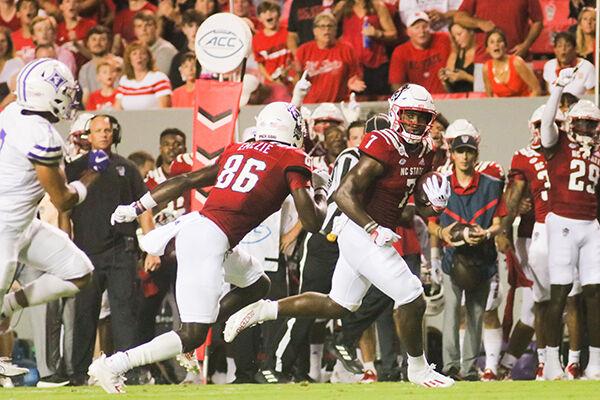 Sophomore runningback Zonavan Knight. breaks down the field with senoir wide reciever Emeka Emezie blocking defenders during the game against Furman on Saturday, Sept. 18, 2021 at Carter-Finley Stadium. Knight had 11 carries for 104 yards with one touchdown. The Wolfpack beat the Furman Paladins 45-7.