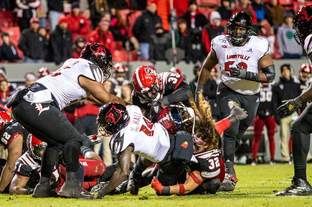 Freshman linebacker Drake Thomas tackles versus Louisville on Saturday, Nov. 16, 2019 at Carter-Finley stadium. Thomas had five total tackles in the 34-20 loss.