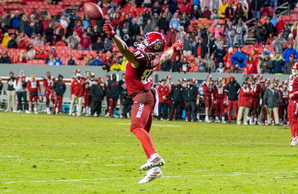 Redshirt sophmore wide receiver Thayer Thomas misses a pass from redshirt sophmore quarterback Bailey Hockman on Saturday, Nov. 30, 2019 at Carter-Finley Stadium. The Wolfpack added a 41-10 loss to their miserable season.