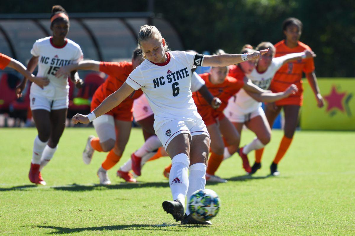 Redshirt junior defender Lulu Guttenberger scores off a penalty kick during the game versus the Syracuse Orange on Sunday, Oct. 24, 2021 in Dail Soccer Field. The Wolfpack beat the Orange 3-0.