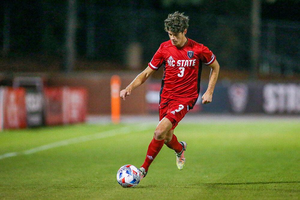 Senior defender Pepe Garcia runs with the ball during the NC State's game against Boston College. NC State took down Boston College 1-0 in the second overtime period at Dail Soccer Stadium on Friday, Oct. 29, 2021.