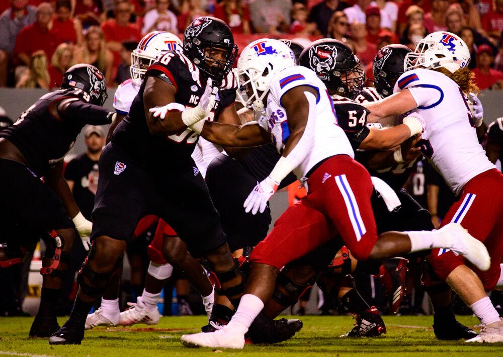 Redshirt junior offensive lineman Bryson Speas pass blocks against Louisiana Tech on Saturday, Oct. 2, 2021 at Carter-Finley Stadium. The Wolfpack won 34-27.