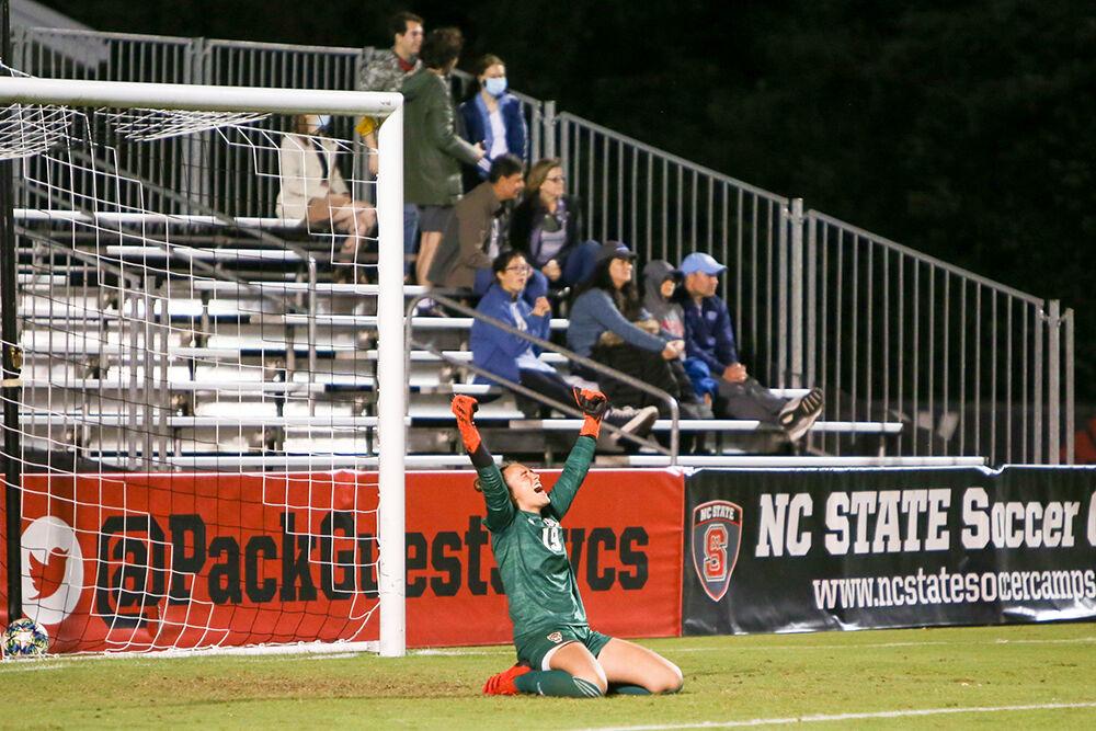 Freshman goalkeeper Maria Echezarreta celebrates during the women's soccer match between the NC State Wolfpack and the North Carolina Tar Heels at Dail Soccer Field on Saturday, Oct. 16, 2021. The Wolfpack won the match 1-0.