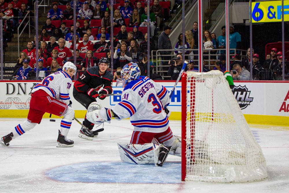 Hurricanes right wing Andrei Svechnikov takes a shot versus the Ranger on Sunday, Feb. 21, 2020 at PNC Arena. Svechnikov had one assist and tallied on one point in the 5-2 loss to the Rangers.