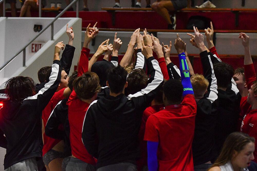 The Wolfpack huddles before its swim meet on Oct 16, 2021 at the Willis R. Casey Aquatic Center.&#160;