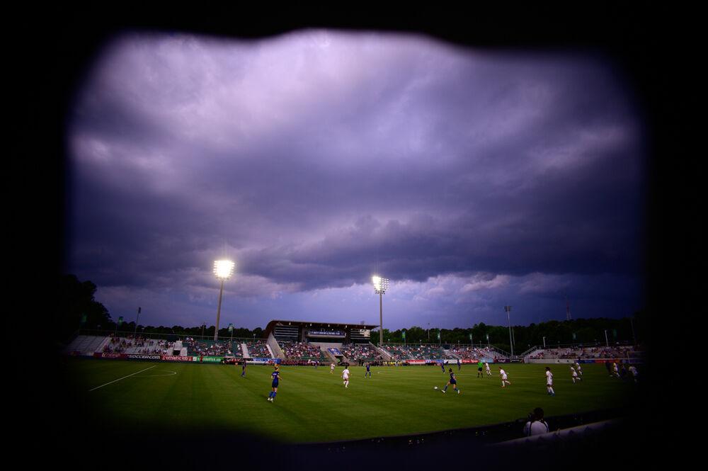 The NC Courage possesses the ball during the first half against Racing Louisville on Friday, May 28, 2021 at WakeMed Soccer Park. The Courage scored four goals in the second half amid heavy rainfall to beat Louisville 5-0.