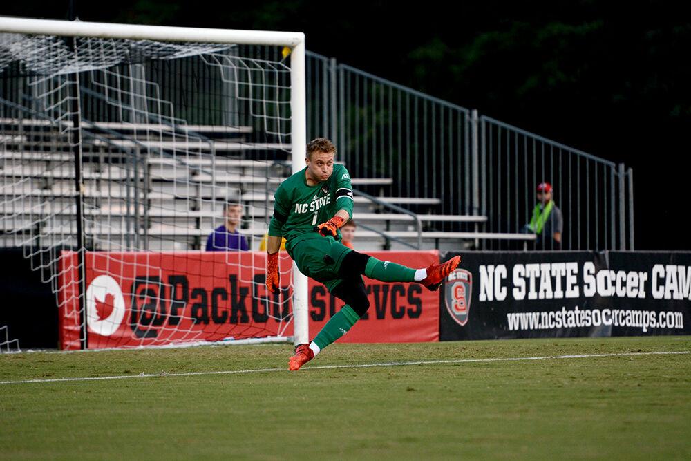 Redshirt senior goal keeper Leon Krapf kicks the ball away to start another Wolfpack offensive run on Monday, Sep. 6, 2021 in Dail Soccer Stadium. Krapf had 4 saves in NC State's 2-1 win over UCF.