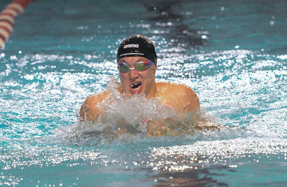 Senior Jack Moranetz swims the 100 breaststroke during the meet against Tennessee on Friday, Oct. 15, 2021 in the Willis R. Casey Aquatic Center. The Wolfpack men's team beat the Volunteers 205-95.