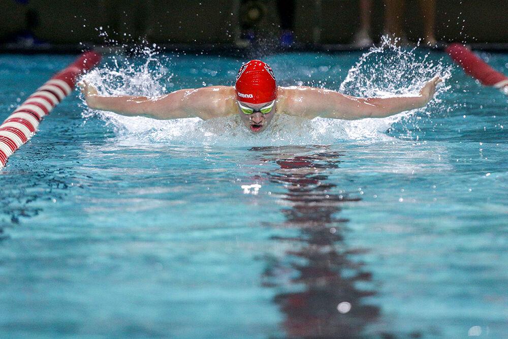 Sophomore Zach Brown swims the 200 yard butterfly. Brown placed first with a 1:47.51 in the 191-104 rout of Duke on Saturday, Jan. 18, 2020 in the Casey Aquatic Center.