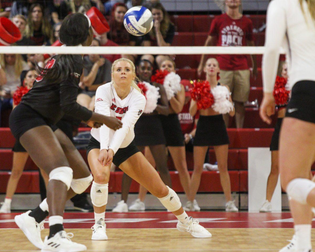 Redshirt sophomore setter Kaylee Frazier prepares to receive the serve during the 3-1 victory over Kansas State on Friday, Aug. 30, 2019 in Reynolds Coliseum.