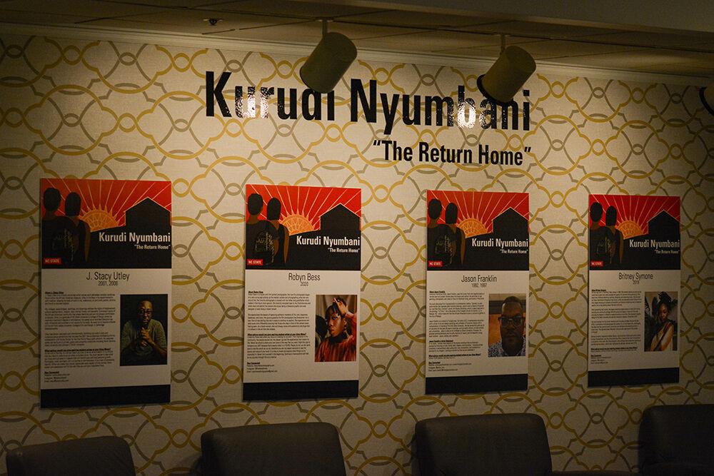 Biographies of each artist are displayed on the wall on Monday, Oct. 25, 2021 at the African American Cultural Center Gallery inside the Witherspoon Student Center. The new exhibition featured the works of J Stacy Utley, Britney Symone, Jason Franklin, and Robyn Bess.
