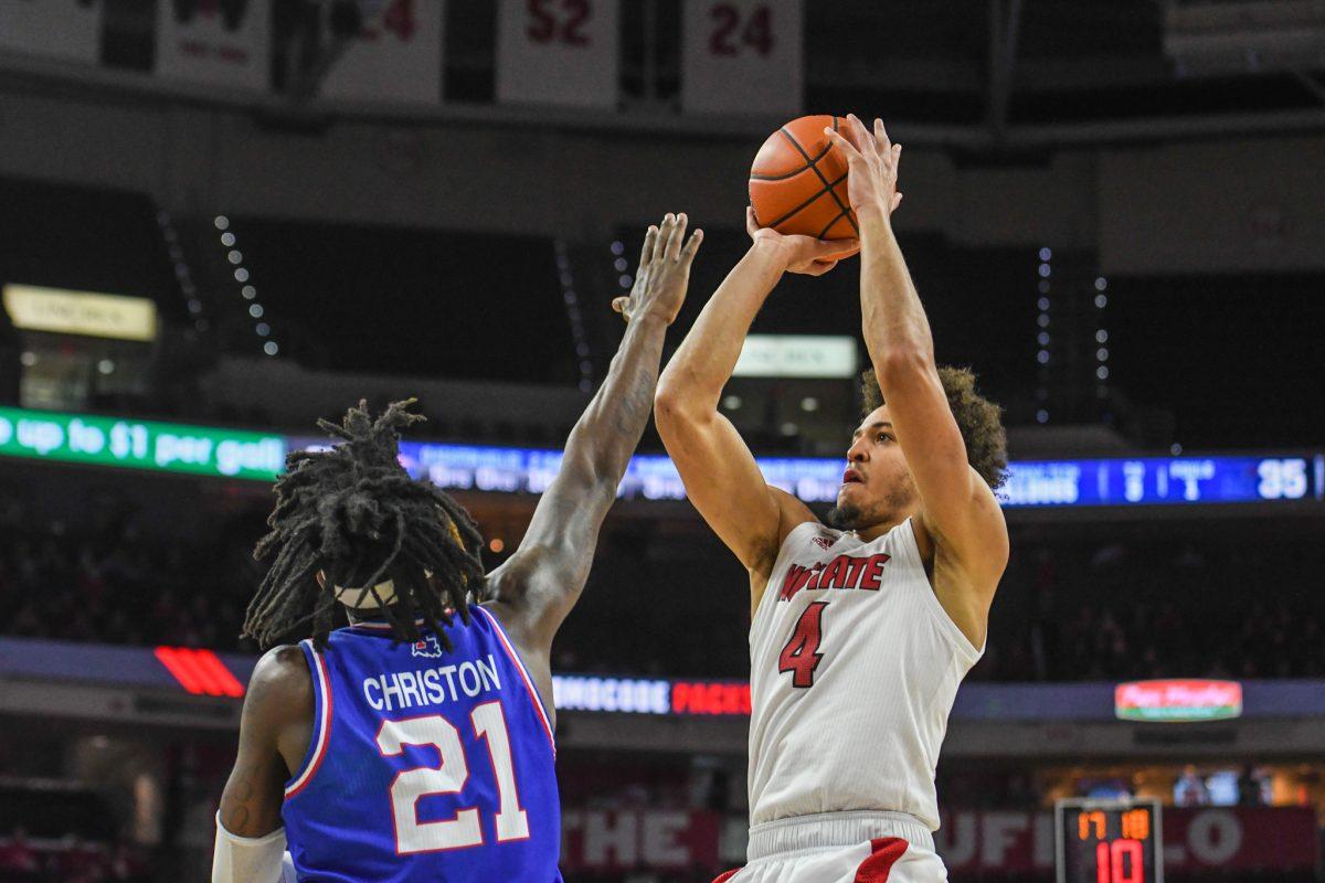 Senior forward Jericole Hellems goes up for a quick shot during the game versus Louisiana Tech on Saturday, Nov. 27, 2021 in PNC Arena. Hellems scored 32 points against the Bulldogs. NC State beat Louisiana Tech 90-81.