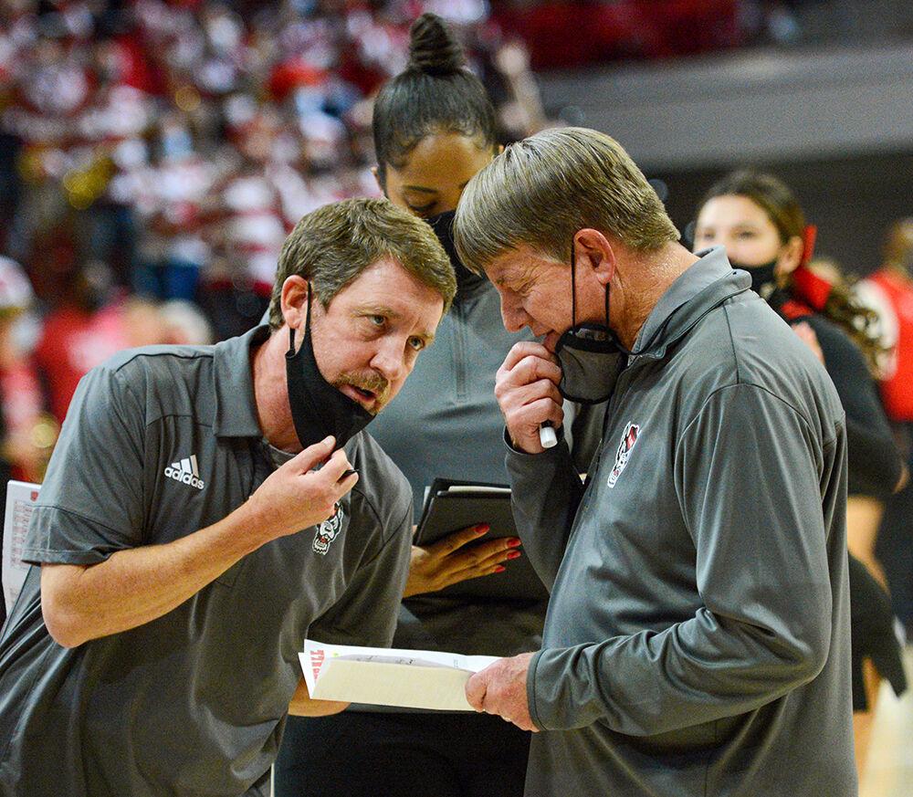 Houston Fancher confides in head coach Wes Moore at the William Reynolds coliseum on Monday, Nov. 15, 2021. Moore's leadership led the Women's Basketball team to a 100-52 victory over the Tigers.