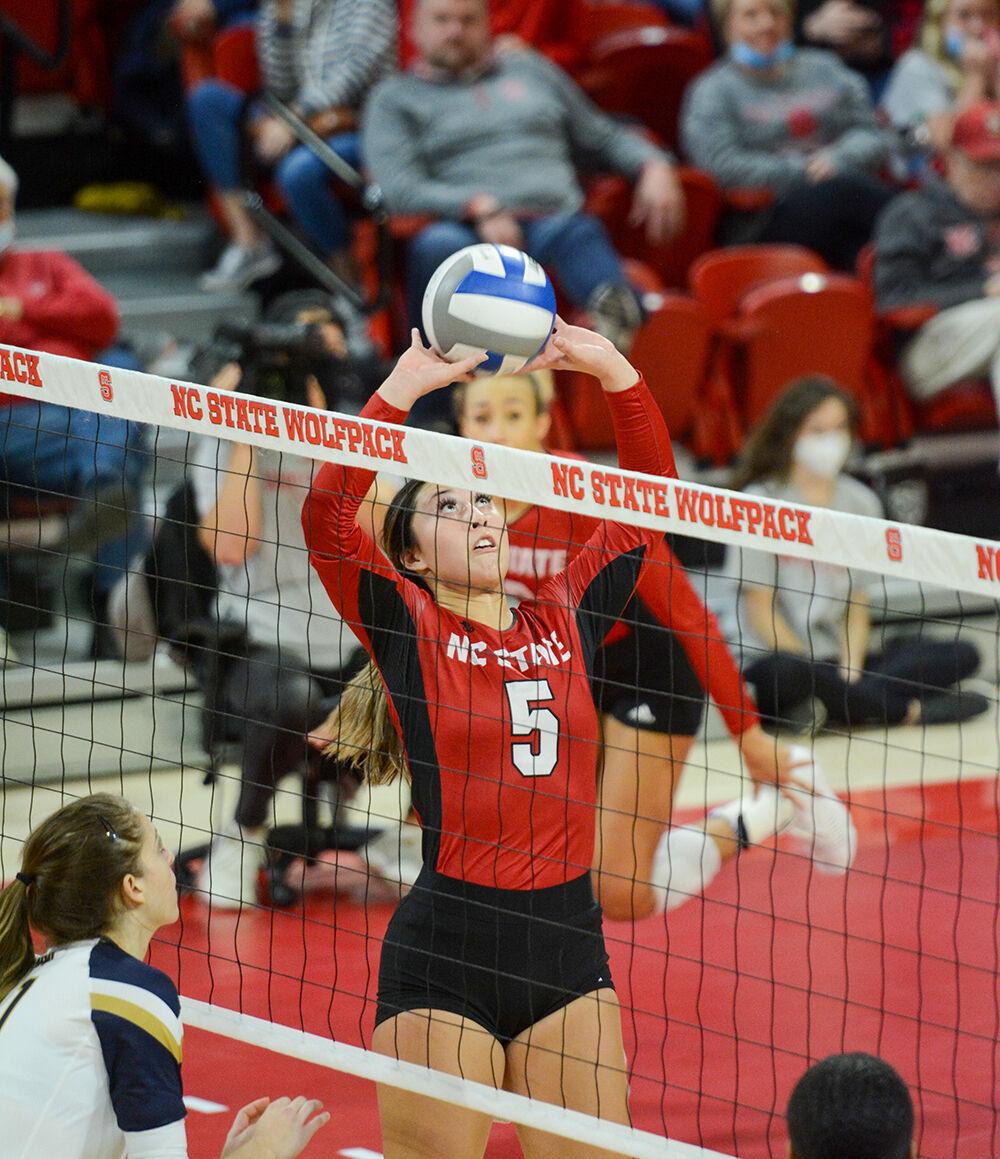 Junior setter Kristen McDaniel sets the ball during the game against Notre Dame on Sunday, Nov. 7, 2021 in Reynolds Coliseum. McDaniel had 60 assists in the match. The Wolfpack beat the Fighting Irish 3-2.