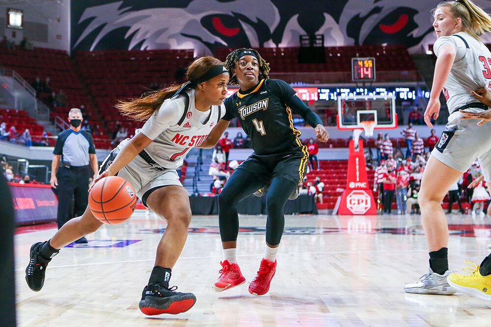 Sophomore guard Genesis Bryant drives toward the interior during the game against Towson. NC State took down Towson 100-52 in Reynolds Coliseum on Monday, Nov. 15, 2021.
