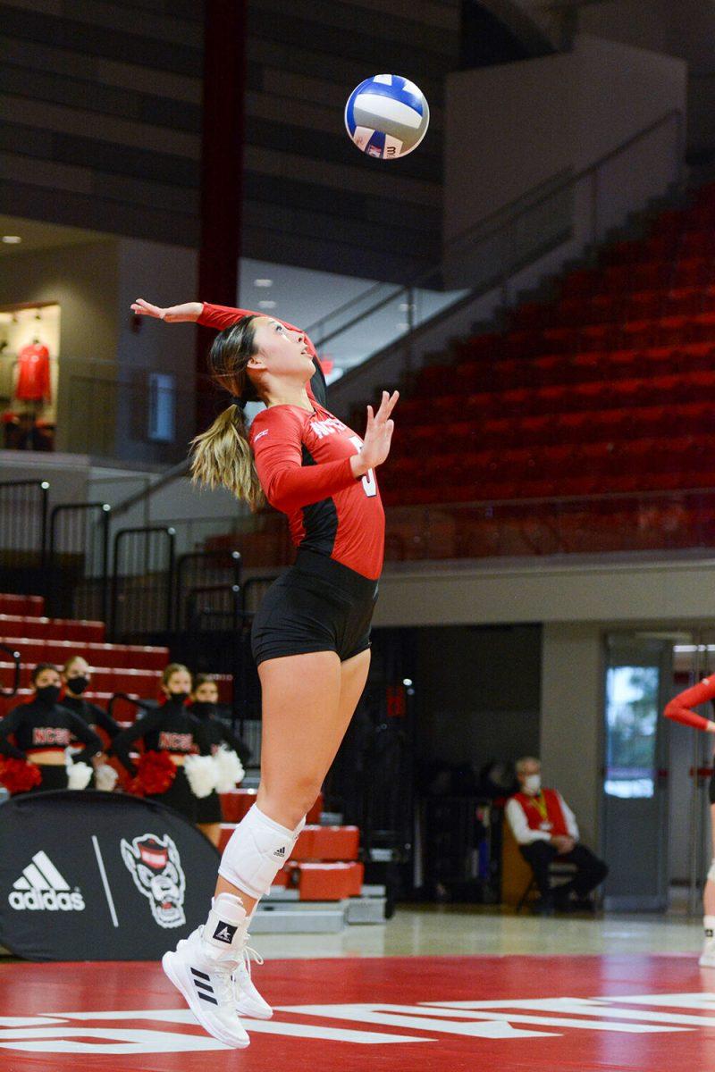 Junior setter Kristen McDaniel serves the ball during the game against Notre Dame on Sunday, Nov. 7, 2021 in Reynolds Coliseum. McDaniel scored 3 aces against Notre Dame. The Wolfpack beat the Fighting Irish 3-2.