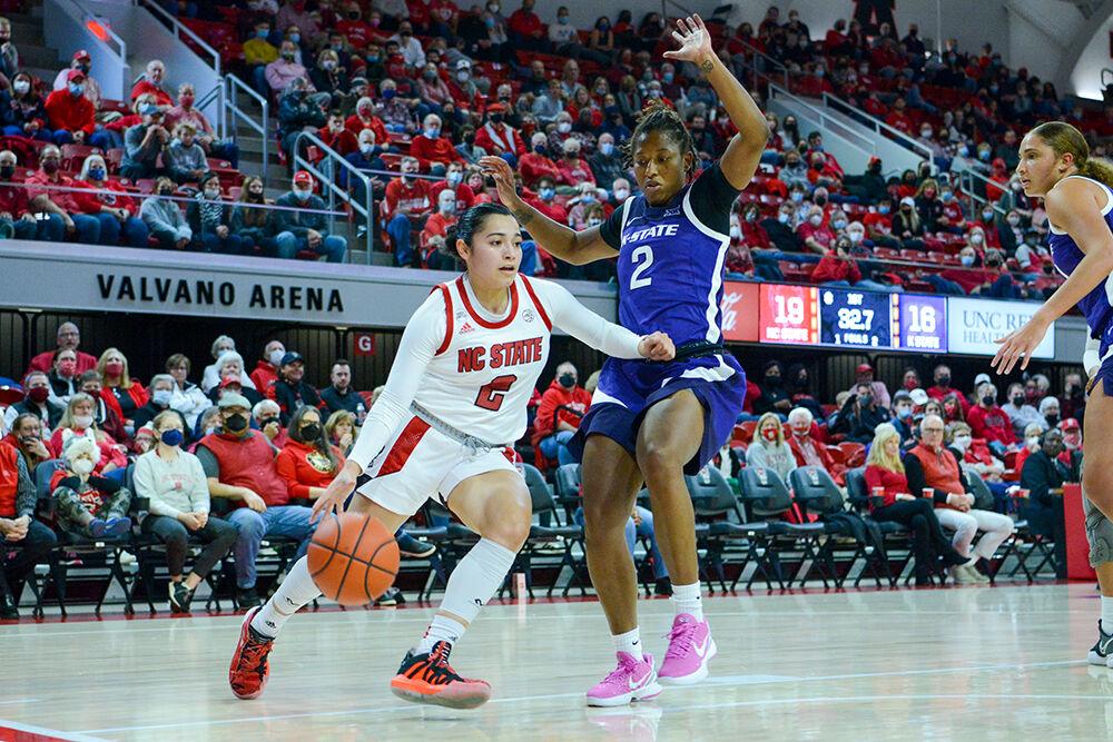Graduate student guard Raina Perez runs the ball down the court in the game against Kansas State on Friday, Nov. 19, 2021 in Reynolds Coliseum. Perez scored 12 points for the Wolfpack. NC State beat Kansas State 90-69.