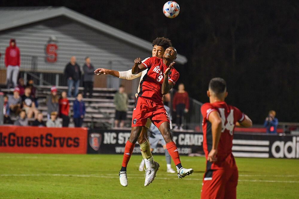 Senior forward Kuda Muskwe heads the ball against Boston College on Friday, Oct 29, 2021 at Dail Soccer Field. The Wolfpack won 1-0 against the Eagles in the second overtime.