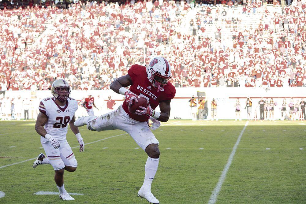 Sophomore running back Nyheim Hines receives a pass during the homecoming game in Carter-Finley Stadium on Saturday, Oct. 29, 2016. Hines received for 62 yards and rushed for three yards. Boston College won against the Wolfpack 21-14.