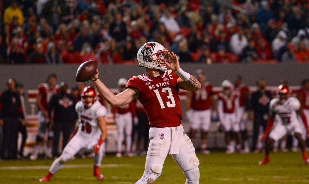Redshirt sophomore quarterback Devin Leary throws a pass against the Louisville Cardinals on Saturday, Oct. 30, 2021 at Carter-Finley Stadium. Leary passed for 317 yards and four touchdowns in NC State's 28-13 victory over Louisville.&#160;