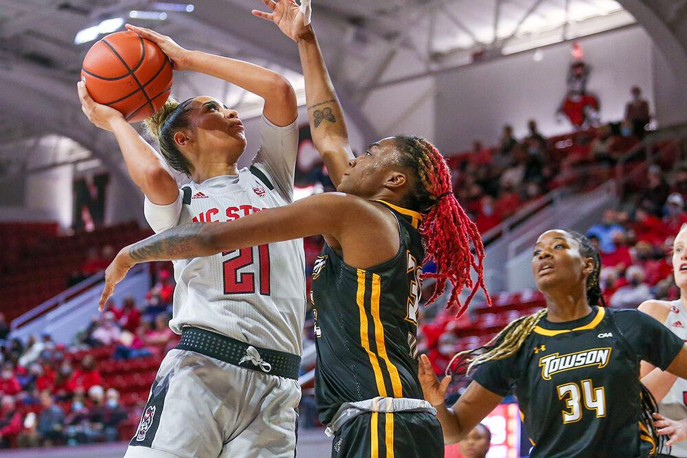Sophomore guard Madison Hayes goes up for a contested shot. NC State took down Towson 100-52 in Reynolds Coliseum on Monday, Nov. 15, 2021.