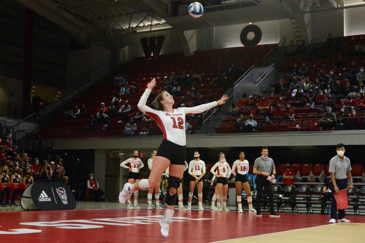 Redshirt junior outside hitter Taylor Rowland serves the ball on Friday, Nov. 5, 2021 in Reynolds Coliseum. Rowland had three kills and five digs during this game. NC State lost to Louisville by 3-0.