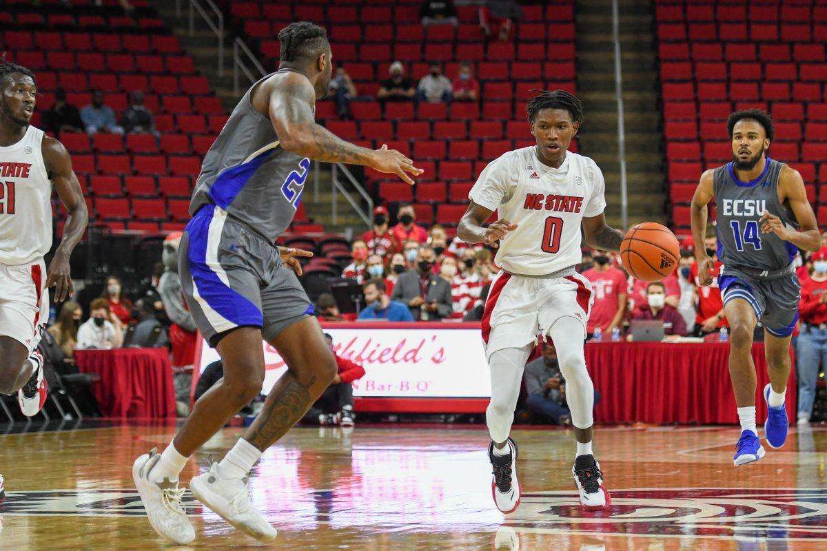 Freshman guard Terquavion Smith drives down the court during the game versus Elizabeth City State on Monday, Nov. 1, 2021 in PNC Arena. Smith scored 15 points for the Wolfpack in his freshman debut. The Wolfpack beat the Vikings 87-68.