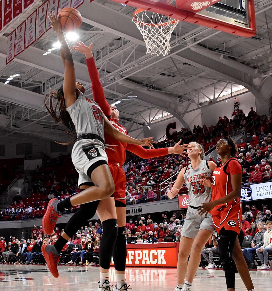 Graduate forward Kayla Jones takes a layup against Georgia on Thursday, Dec. 16, 2021 at Reynolds Coliseum. Jones had 9 points during the game but the Wolfpack lost to the Bulldogs 82-80 in overtime.