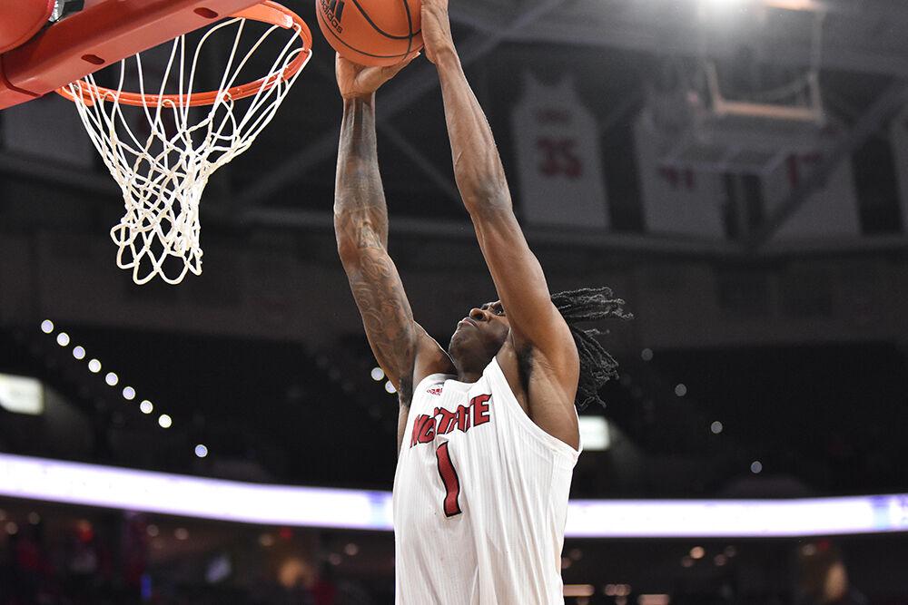 Redshirt sophomore guard Dereon Seabron goes to dunk the ball in the game against Nebraska in PNC Arena on Wednesday, Dec. 1, 2021. Seabron scored 39 points in the game. NC State won in quadruple overtime 104-100.