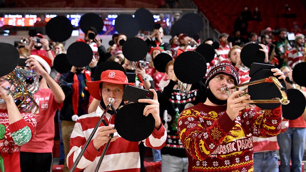 The NC State pep band performs during the NC State women&#8217;s basketball game against Virginia at Reynolds Coliseum on Sunday, Dec. 19, 2021. NC State beat Virginia 82-55.