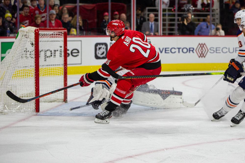 Hurricanes right wing Sebastian Aho scores a goal in the second period versus the Oilers on Sunday, Feb. 16, 2020 at PNC Arena. Aho had two goals and one assist in the 4-3 overtime loss to the Edmonton Oilers.