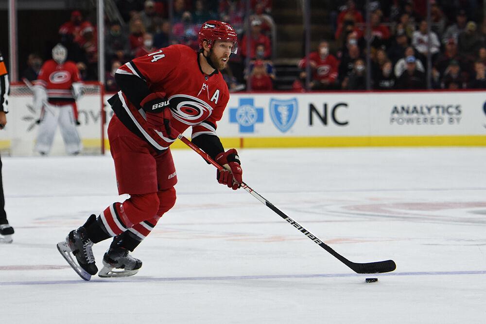 Defender Jaccob Slavin handles the puck in the game against the St. Louis Blues in PNC Arena on Saturday, Nov. 13, 2021. The Hurricanes won 3-2.