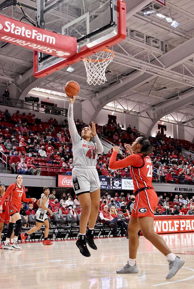 Junior center Camille Hobby takes a shot against Georgia at Reynolds Coliseum on Thursday, Dec. 16, 2021. Hobby had 5 rebounds but NC State lost to Georgia 82-80 in overtime.