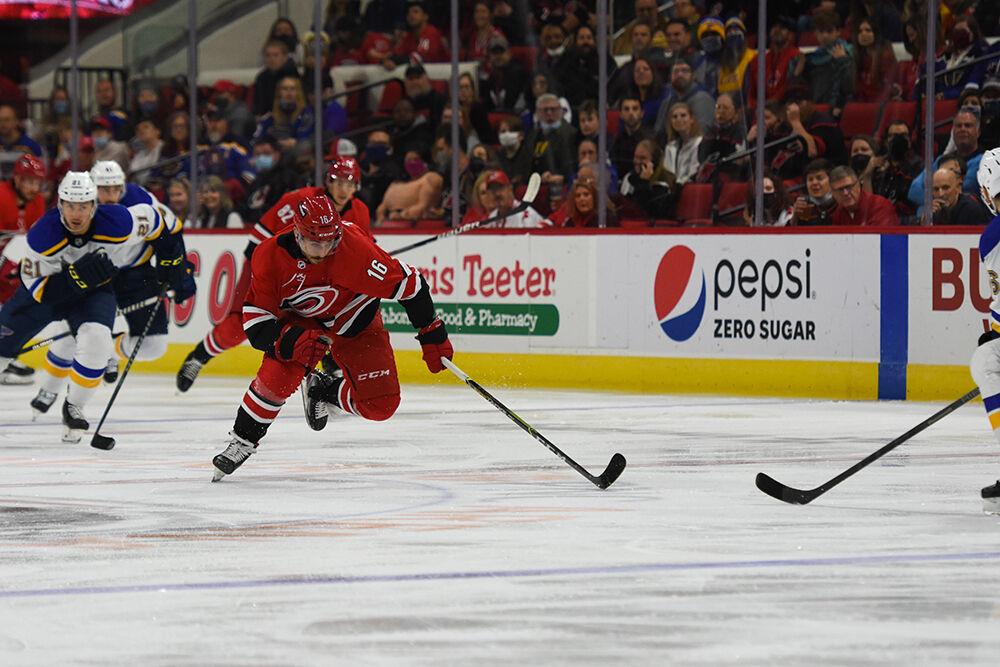 Center Vincent Trocheck races to the puck in the game against the St. Louis Blues in PNC Arena on Saturday, Nov. 13, 2021. The Hurricanes beat the Blues 3-2.