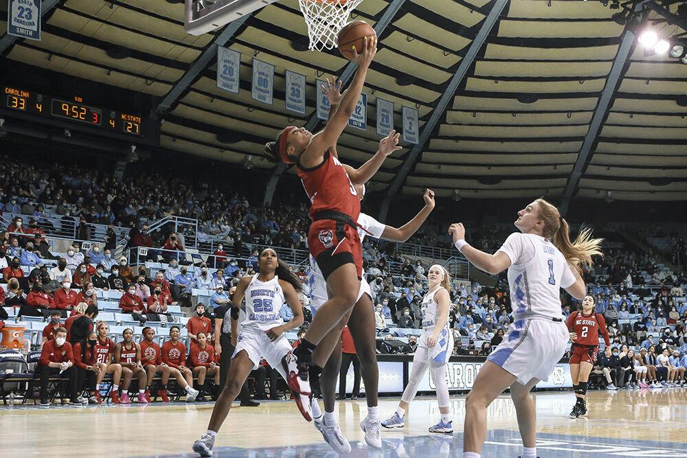 Graduate guard Kai Crutchfield goes for a layup in the away game against the UNC Tar Heels in UNC's Carmichael Arena on Sunday, Jan. 30, 2022. Crutchfield scored 16 points and had two assists. The Wolfpack won 66-58.