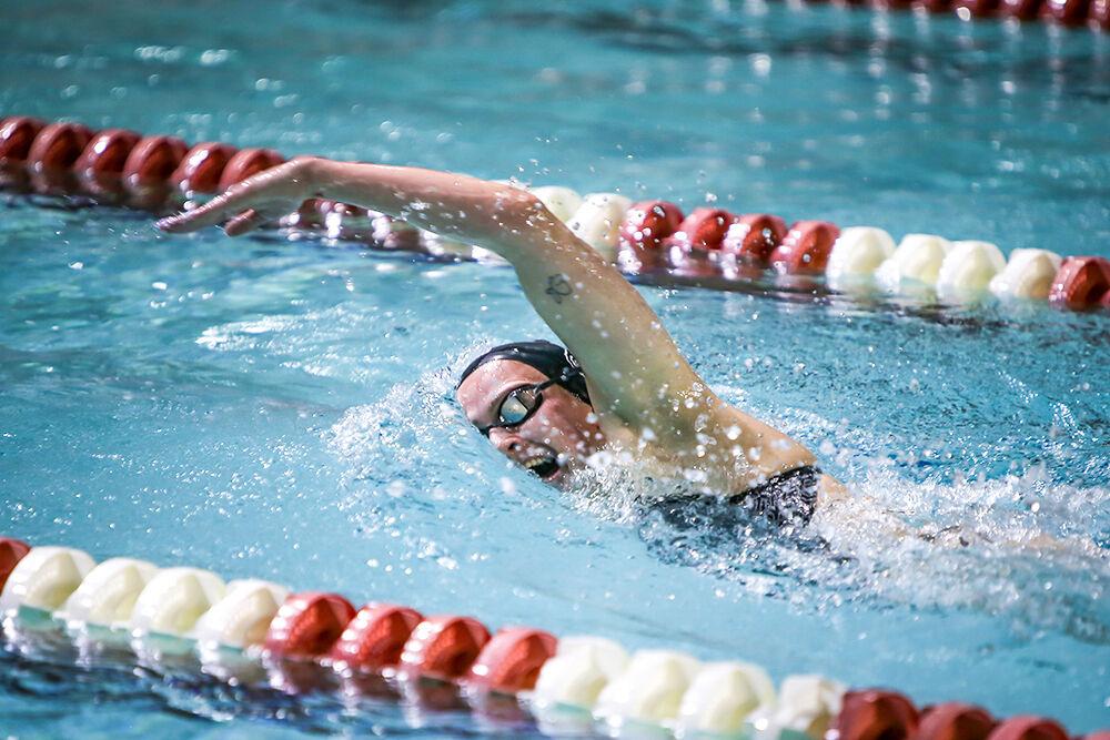 NC State junior Brooke Travis competes in the women's 1000-yard freestyle during the NC State Wolfpack's swimming and diving meet against the Duke Blue Devils on Saturday, Jan. 15, 2022. Travis won the race with a time of 10:05.44.&#160;The Pack women beat the Blue Devils 139-87.