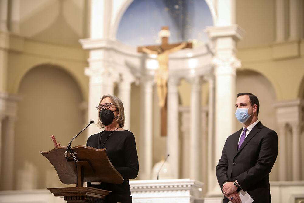 NC State LIVE director Sharon Moore introduces the American Spiritual Ensemble before a performance during an NC State LIVE presentation in the Holy Name of Jesus Cathedral on Thursday, Jan. 27, 2022. The ensemble has a mission to preserve and celebrate the tradition of the American Negro spiritual.