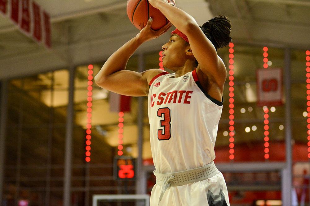 Junior guard Kai Crutchfield shoots a three-pointer during the game versus UNC on Sunday, Jan. 26, 2020 in Reynolds Coliseum. Crutchfield scored 13 points and had 4 rebounds against UNC. The Wolfpack beat the Tar Heels 76-68.