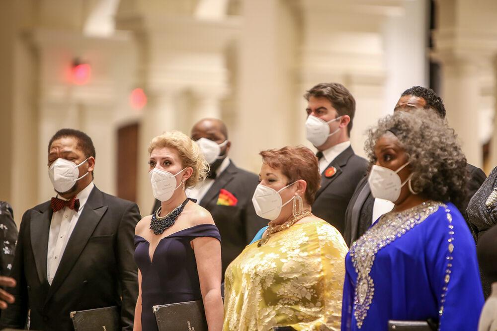 Soprano soloist Jessica Bayne, left, performs I Thank You, Jesus with the American Spiritual Ensemble during an NC State LIVE presentation in the Holy Name of Jesus Cathedral on Thursday, Jan. 27, 2022. The ensemble has a mission to preserve and celebrate the tradition of the American Negro spiritual.