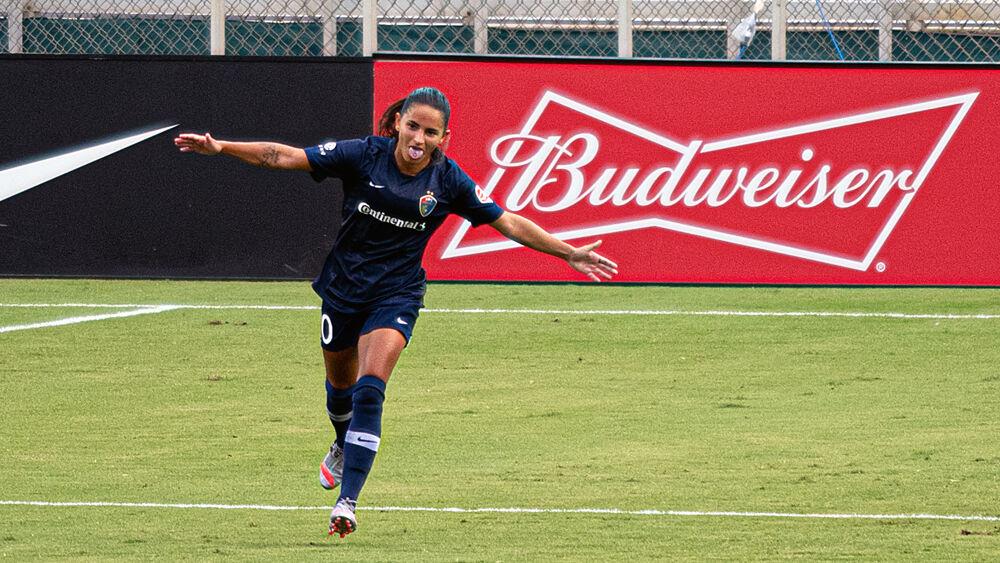 NC Courage midfielder Debinha celebrates scoring against the Houston Dash on Saturday, Sept. 12 at WakeMed Soccer Park. Debinha scored twice including the winning goal in the 86th minute as the Courage won 4-3.