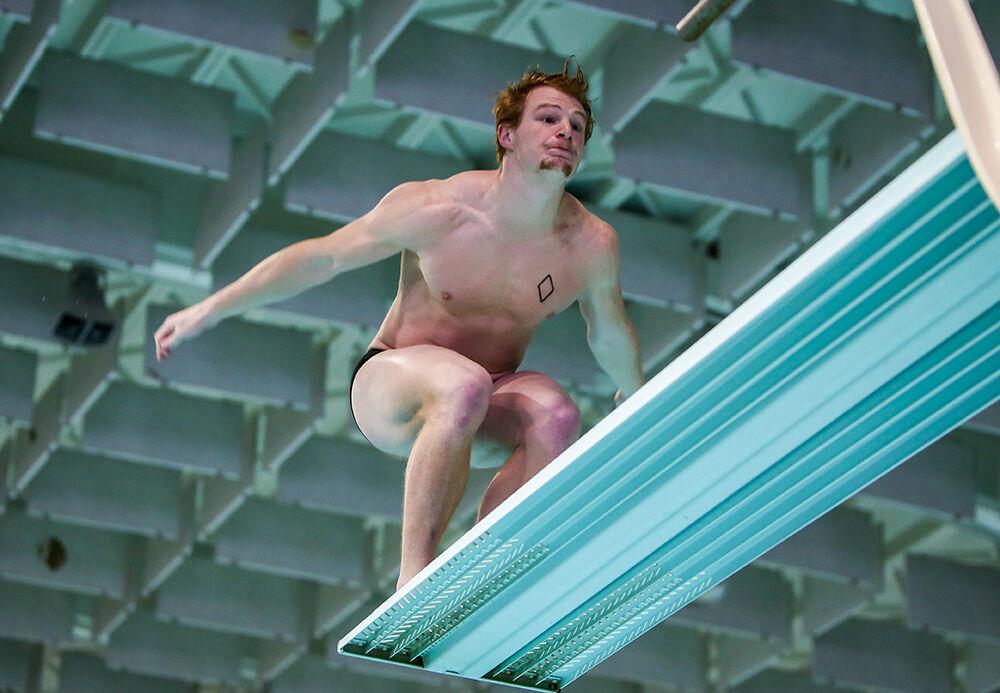 NC State junior Bayne Bennett competes in the men's 3m dive during the NC State Wolfpack's swimming and diving meet against the Duke Blue Devils on Saturday, Jan. 15, 2022. Bennett won both the 1m and 3m dives.&#160;The Pack men beat the Blue Devils 167-56.