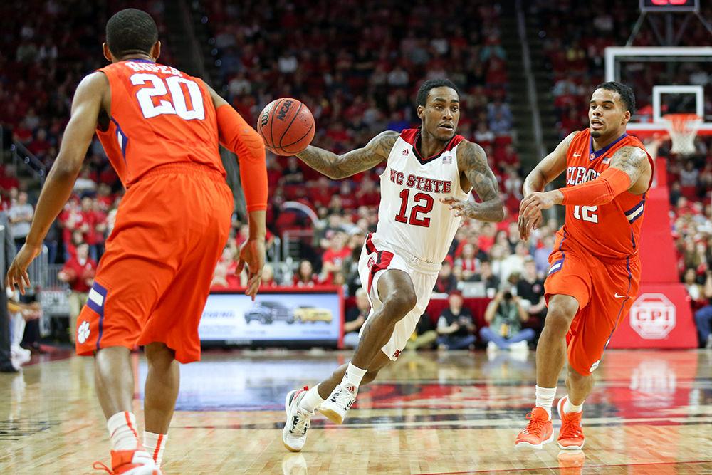 Junior guard Anthony "Cat" Barber drives towards the basket for a tough layup in the first half of the game versus Clemson. Barber finished with 8 points on 1-12 shooting, including 5 assists and 3 rebounds. The NC State Wolfpack beat the Clemson Tigers in a close one, 77-74, at PNC Arena on February 20, 2016.