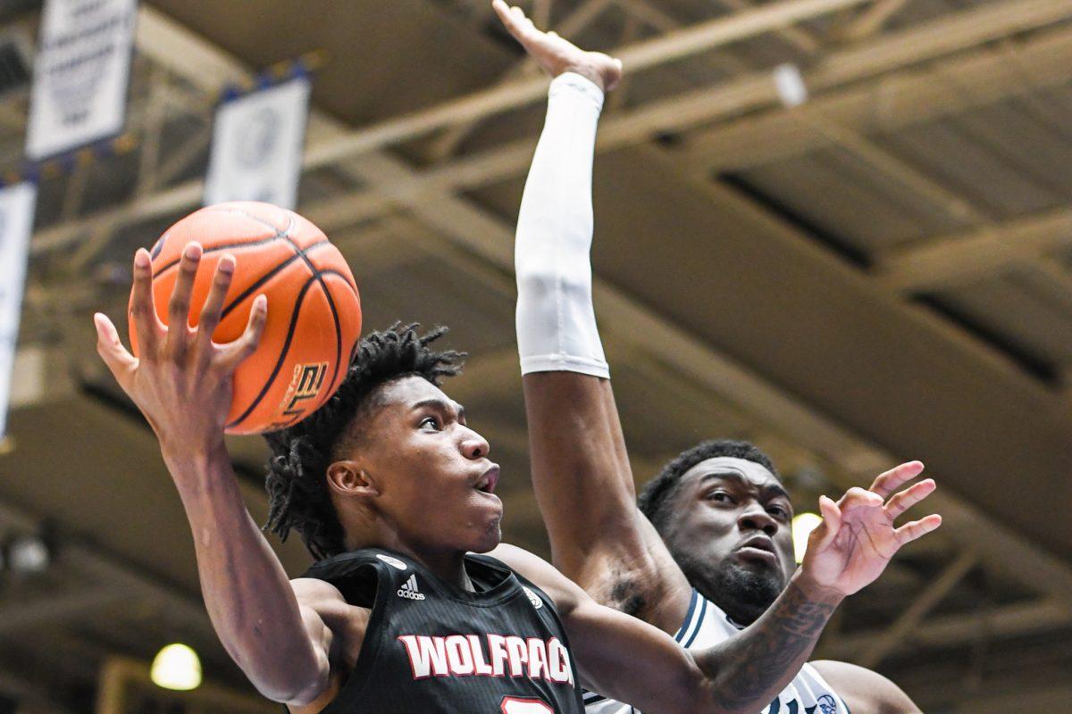 Freshman guard Terquavion Smith goes up for a layup during the game versus Duke Blue Devils on Saturday, Jan. 15, 2022 in Cameron Indoor Stadium. Smith was the Wolfpack's top scorer with 19 points against the Blue Devils. The Wolpack lost to the Blue Devils 88-73.
