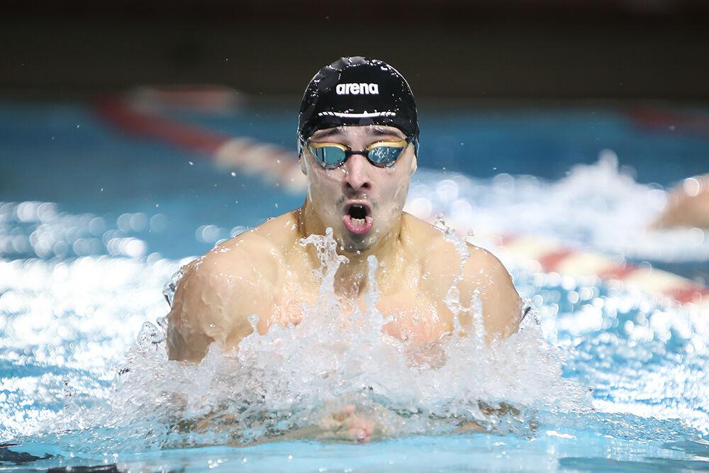 NC State senior Rafal Kusto competes in the men's 100-yard breaststroke during the NC State Wolfpack's swimming and diving meet against the Duke Blue Devils on Saturday, Jan. 15, 2022. Kuston won the race with a time of 53.84.&#160;The Pack men beat the Blue Devils 167-56.
