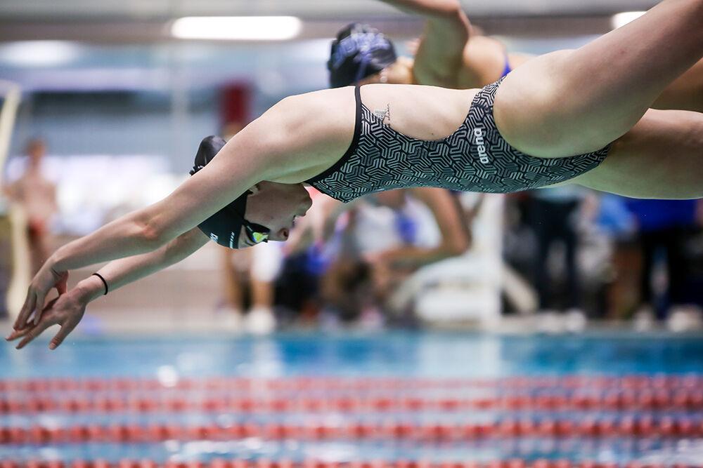 NC State freshman Kaylee Hamblin competes in the women's 100-yard breaststroke during the NC State Wolfpack's swimming and diving meet against the Duke Blue Devils on Saturday, Jan. 15, 2022. Hamblin finished third in the race.&#160;The Pack women beat the Blue Devils 139-87.