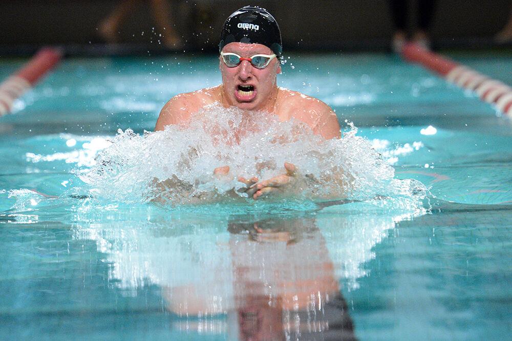 Junior Markus Wennborg competes in the men's 200-yard breaststroke during the NC State Wolfpack's swim and dive meet against the UNC-Wilmington Seahawks on Friday, Jan. 28th, 2022 at Willis R. Casey Aquatics Center. The Pack men beat the Seahawks 184-86.